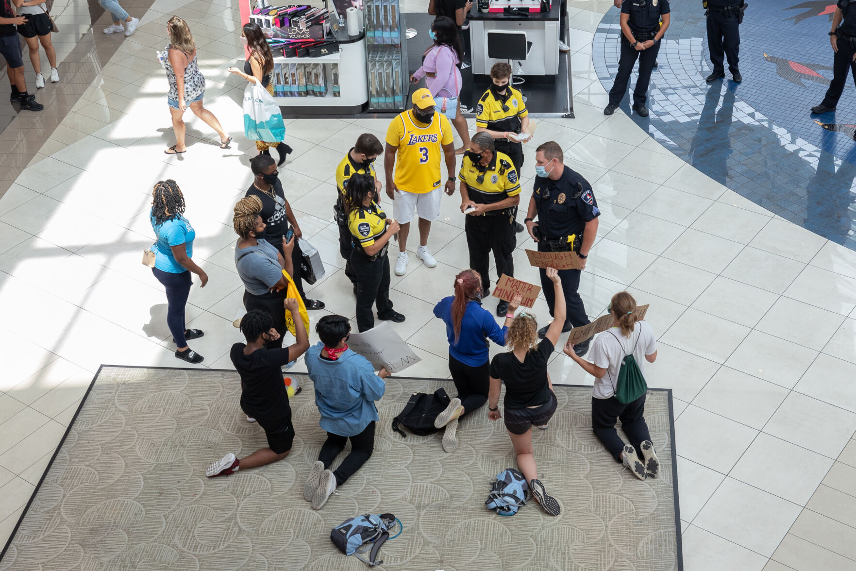Photos: Protesters kneel for Black Lives Matter movement inside The Parks Mall at Arlington